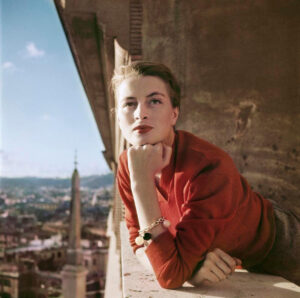 Robert Capa, [Capucine, French model and actress, on a balcony, Rome], August 1951