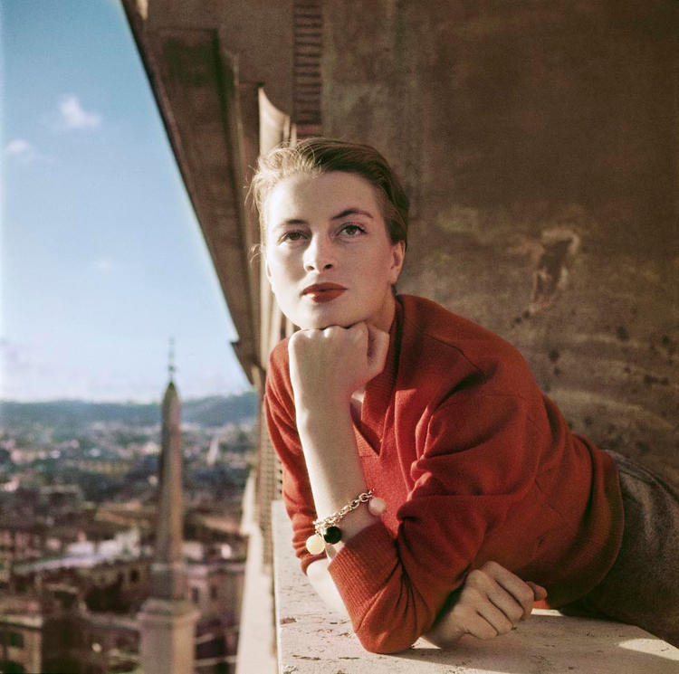 Robert Capa, [Capucine, French model and actress, on a balcony, Rome], August 1951